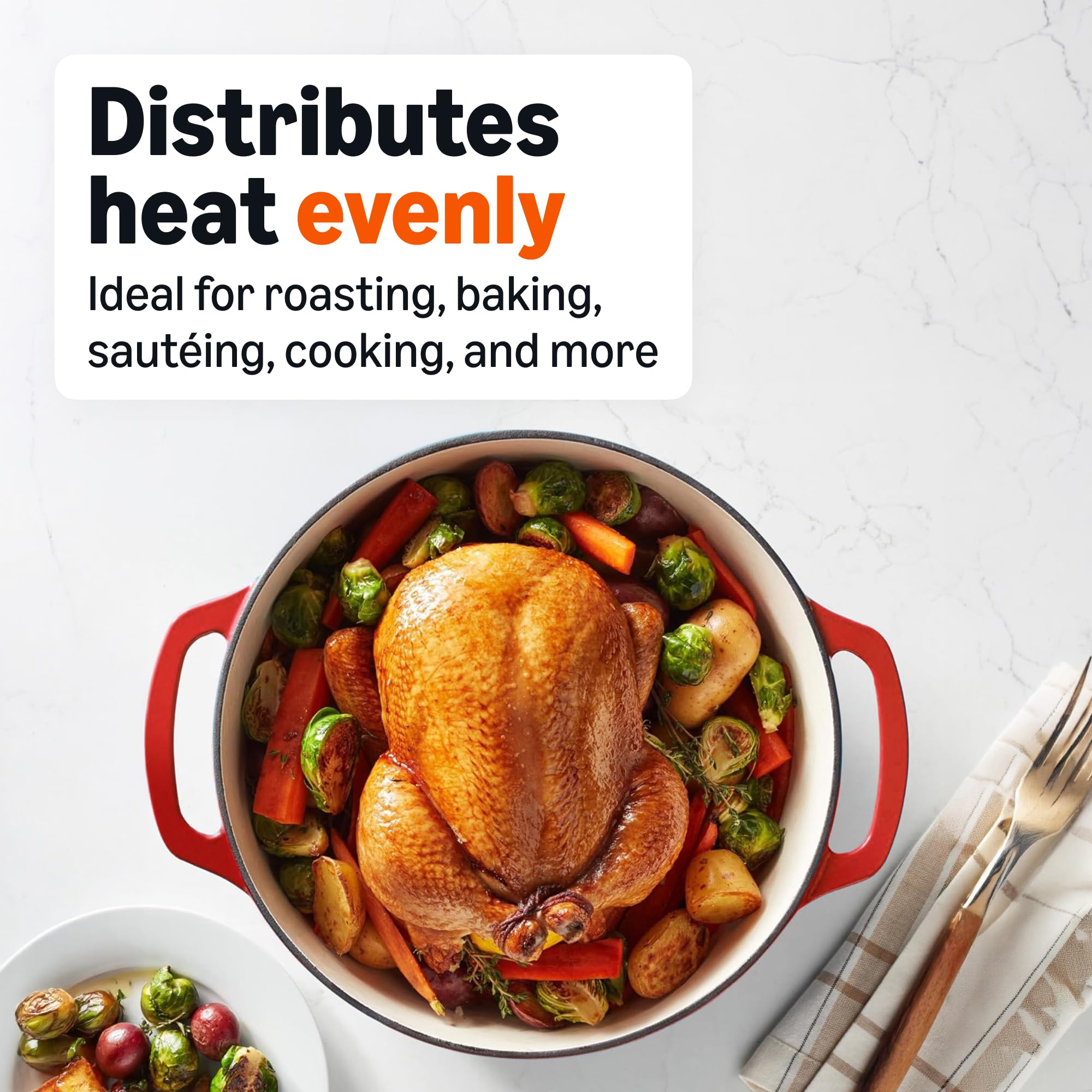 Amazon Basics cocotte rouge dans le four illustrant cuisson à haute température et polyvalence