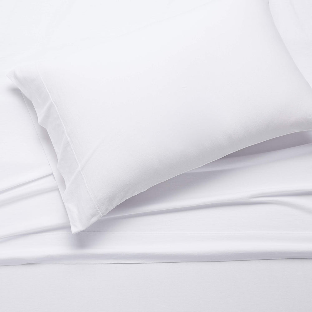 Amazon Basics détail du drap housse extensible garantissant un bon ajustement au matelas