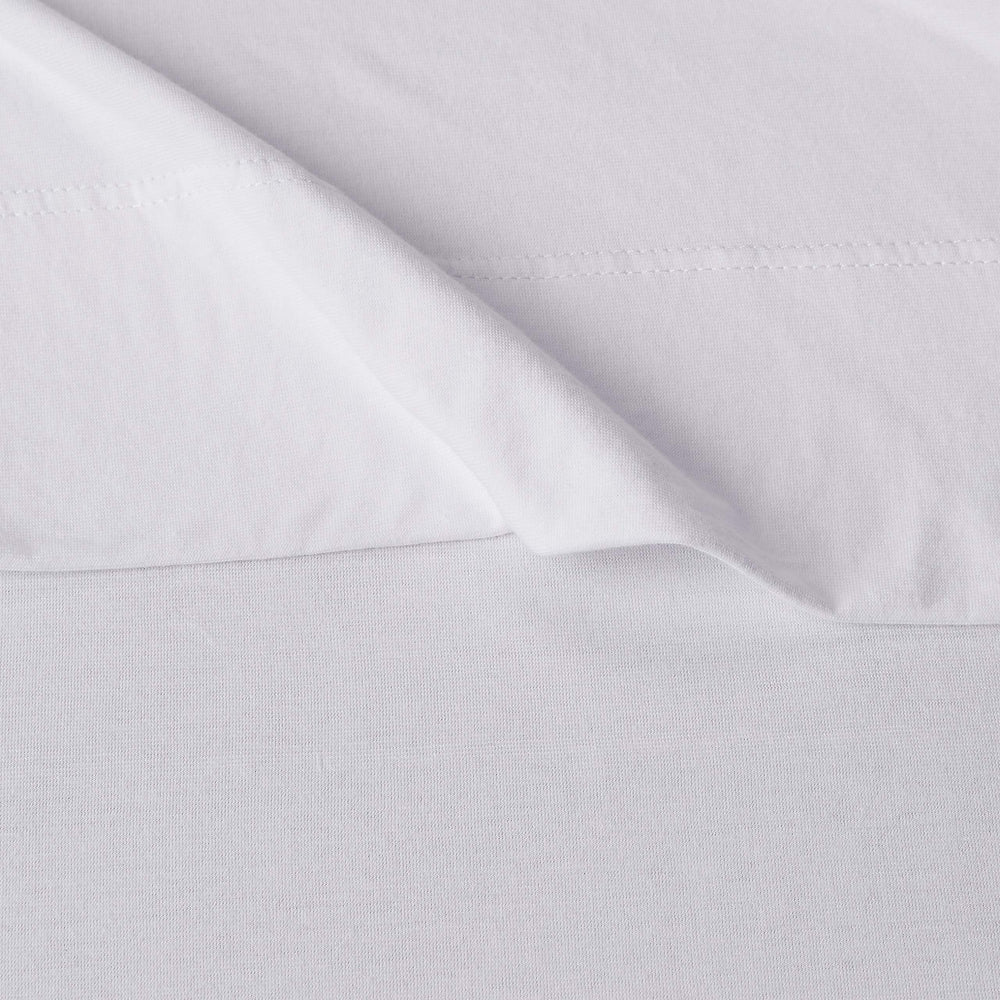 Amazon Basics draps installés sur lit twin montrant maintien et aspect fini