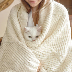 Amélie Home gros plan sur la texture chenille, confort visible au toucher