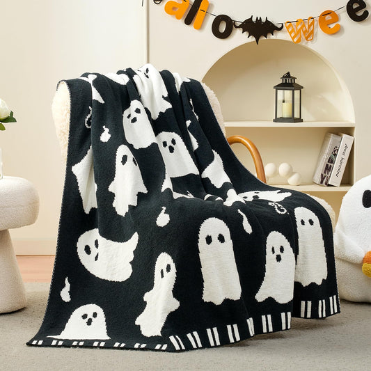 Plaid Amélie Home face avant sur fond sombre, apporte ambiance Halloween cosy