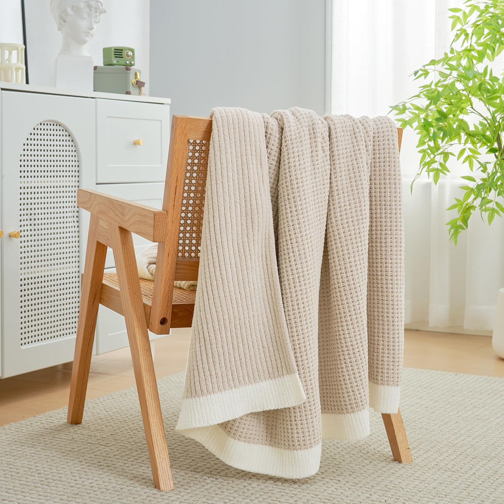 Amélie Home plaid utilisé pour lecture offrant confort et chaleur légère