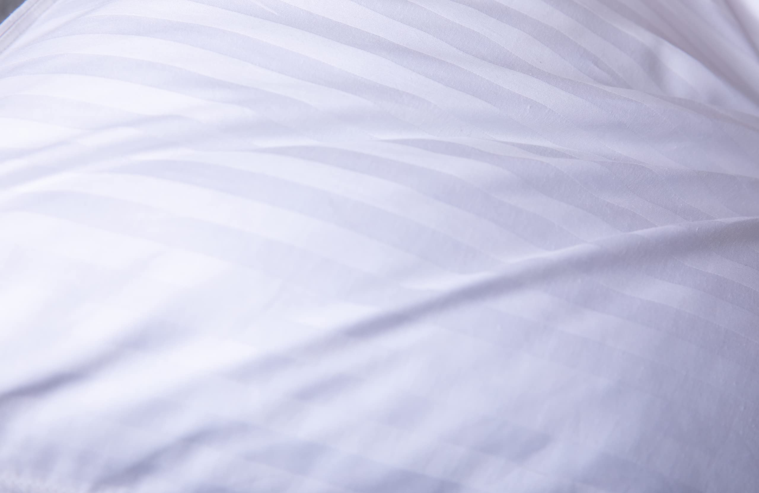 ArcticNorthDown détails surpiqûres et passepoil, évite fuite de duvet