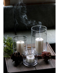 ARIAMOTION photophore avec bougie pilier créant lumière douce et atmosphère
