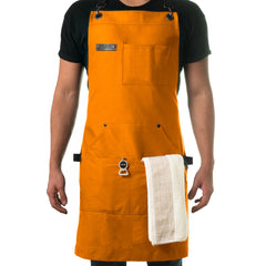 Asaya tablier face avant orange montrant coupe et poches, protection professionnelle