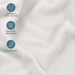 Détail du drap‑housse Bare Home avec élastique, maintien optimal du matelas