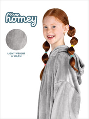 Bare Home capuche généreuse en gros plan, chaleur et enveloppement