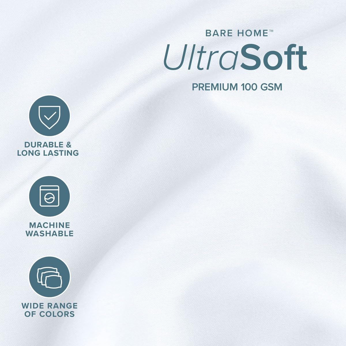 Bare Home drap plat et deux taies étendus illustrant la coupe généreuse et finition