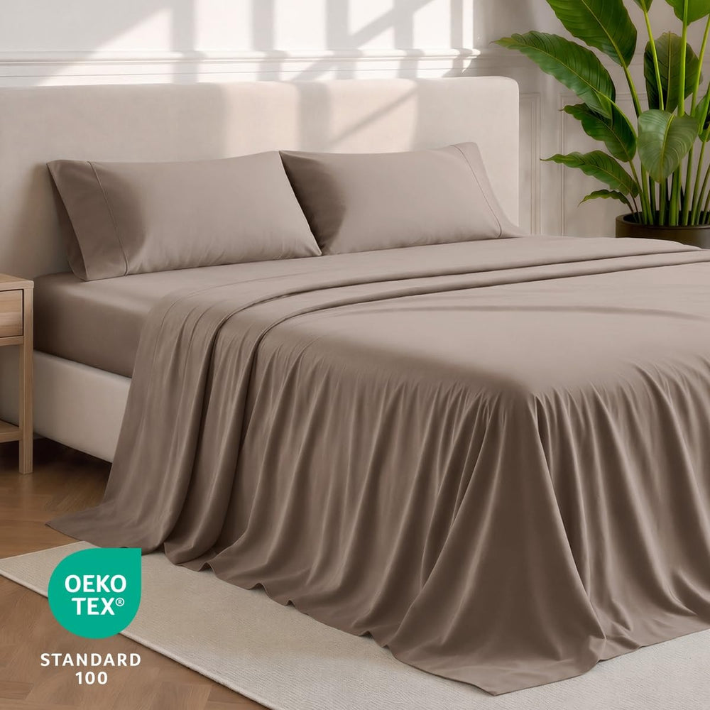 Bare Home drap plat posé sur un lit queen illustrant retombée généreuse