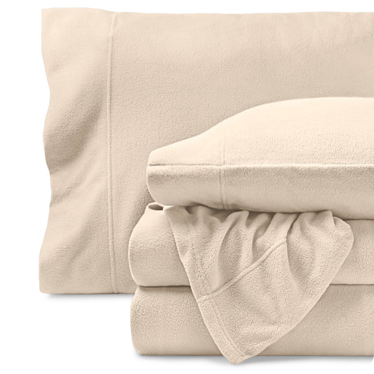 Bare Home ensemble devant posé sur lit montrant l'ajustement et le style
