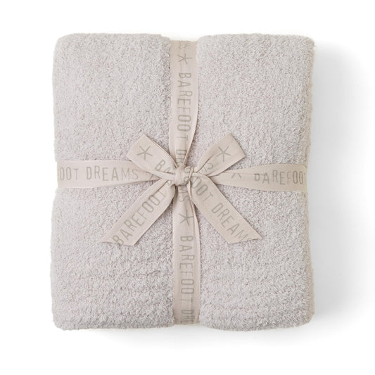 Barefoot Dreams couverture CozyChic face montrant élégance et confort