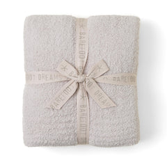 Barefoot Dreams couverture CozyChic face montrant élégance et confort