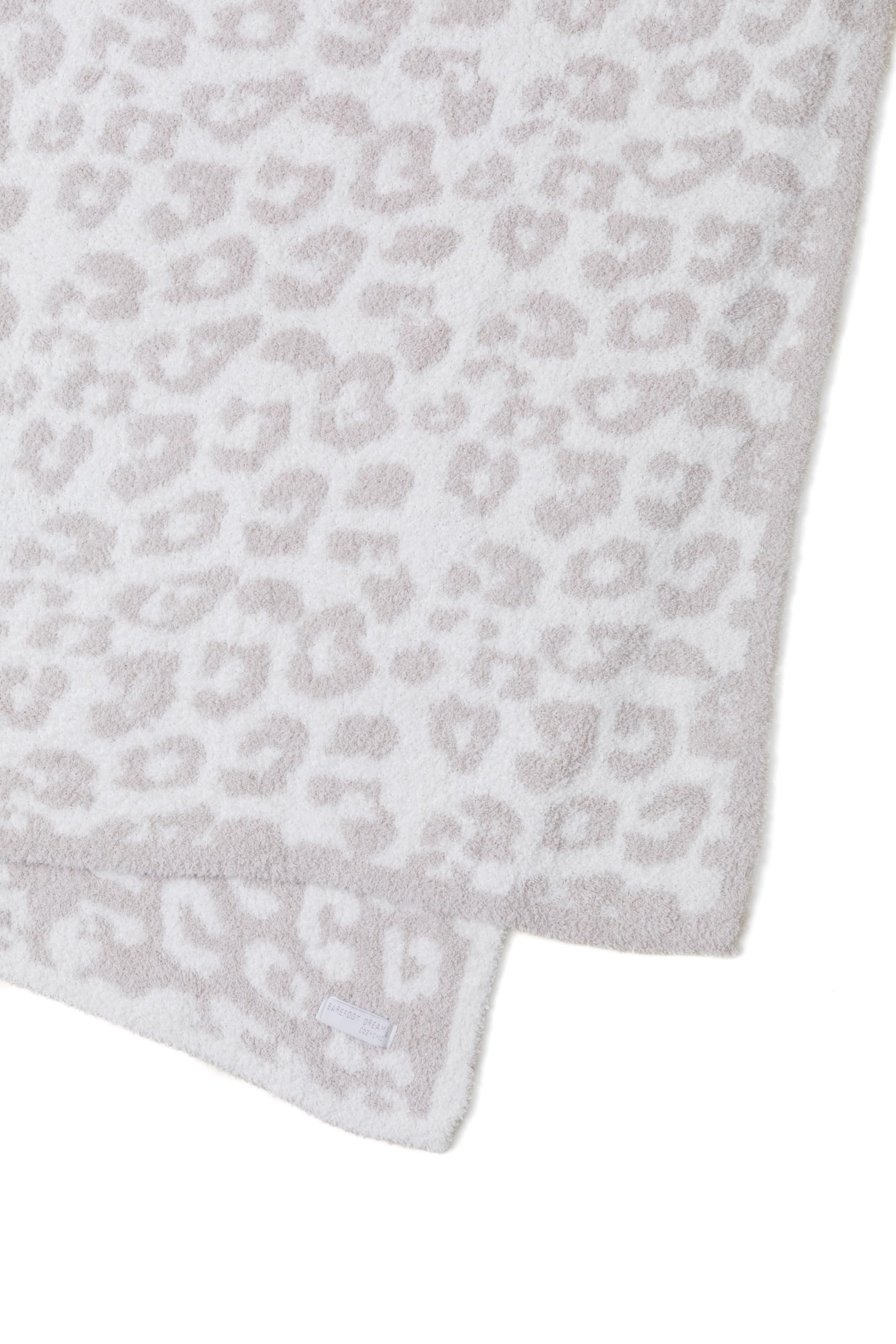 Barefoot Dreams détail jacquard motif animalier montrant finesse et tenue durable