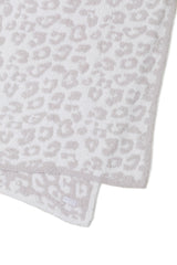 Barefoot Dreams détail jacquard motif animalier montrant finesse et tenue durable