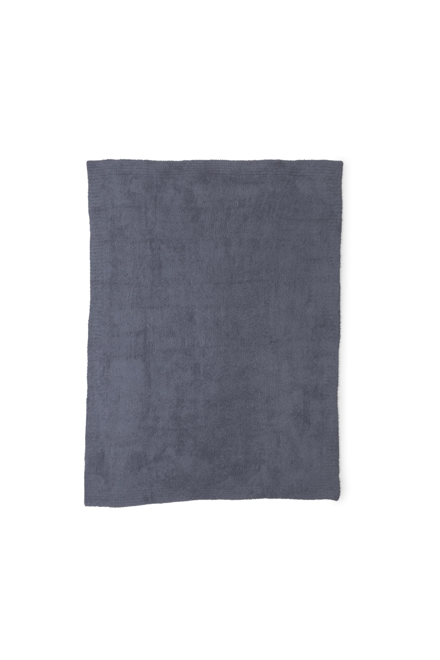 Barefoot Dreams plaid Drapé sur canapé apportant chaleur salon