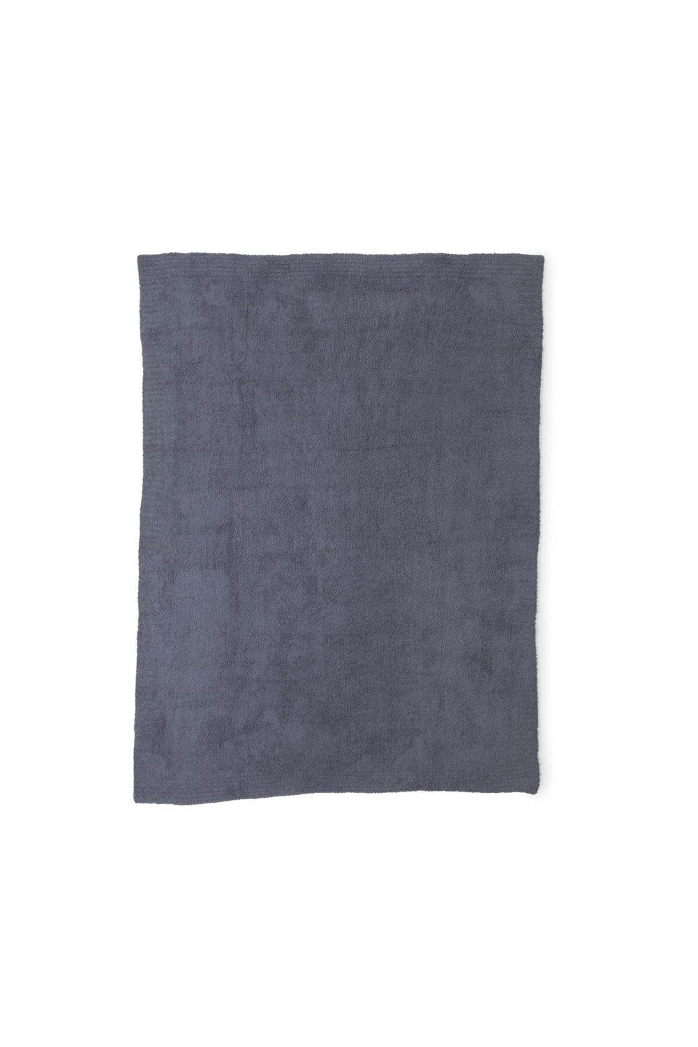 Barefoot Dreams plaid Drapé sur canapé apportant chaleur salon