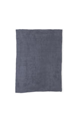 Barefoot Dreams plaid Drapé sur canapé apportant chaleur salon