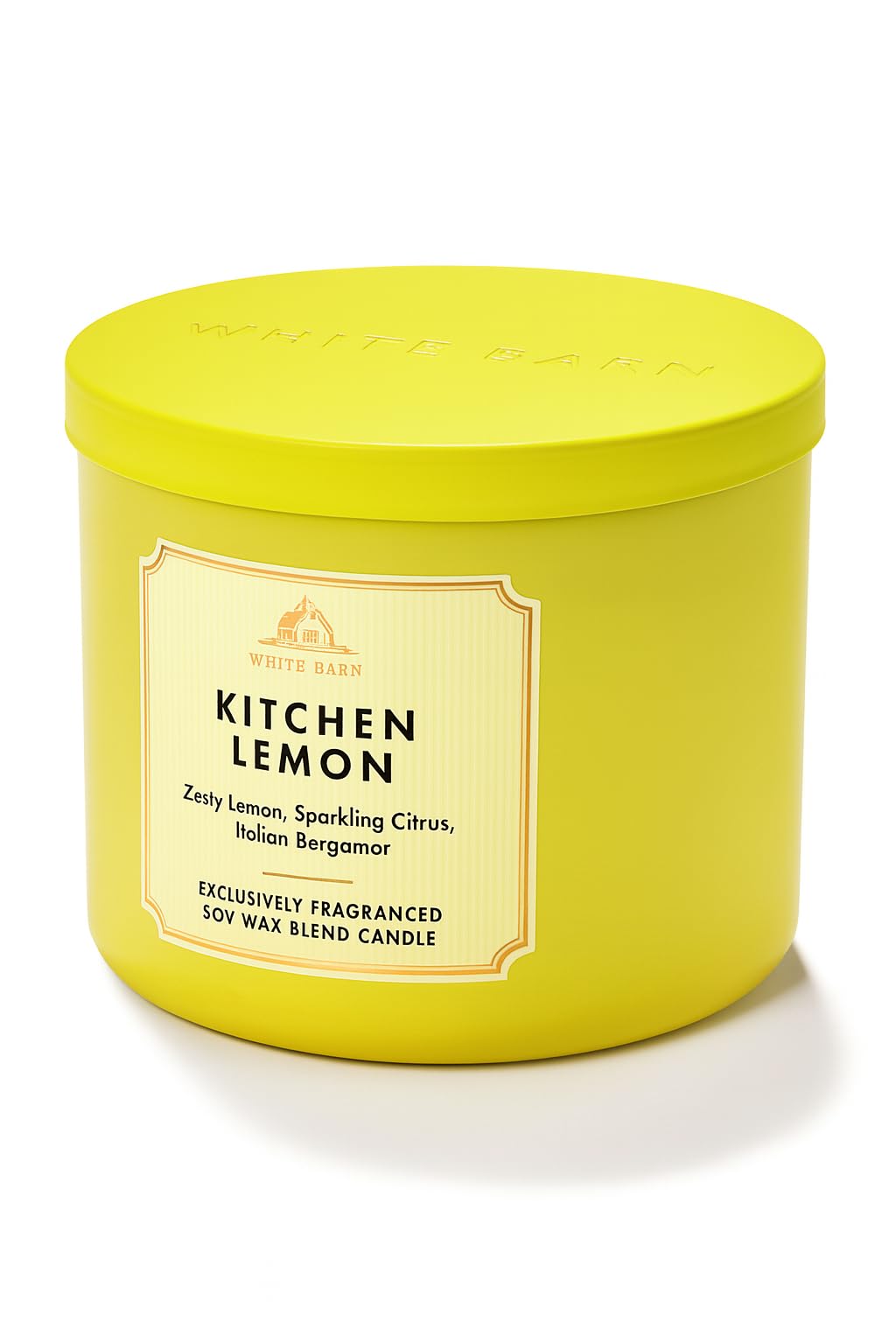 Bath & Body Works pot jaune en verre montrant l'étiquette, ajoute fraîcheur décorative