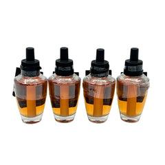 Bath & Body Works recharge Caramel Pumpkin Swirl en usage dans une prise murale diffuse une atmosphère chaleureuse