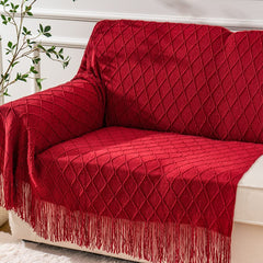 BATTILO HOME plaid rouge drapé sur canapé qui apporte chaleur visuelle au salon