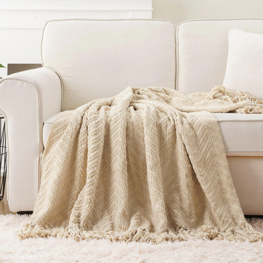 BATTILO HOME jeté posé sur lit créant ambiance cosy
