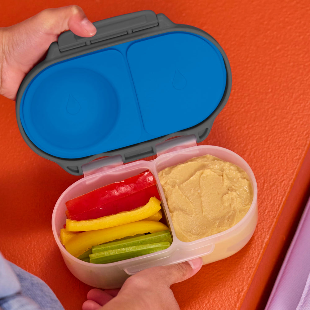 b.box enfant ouvre la boîte facilement grâce aux larges clips, autonomie encouragée