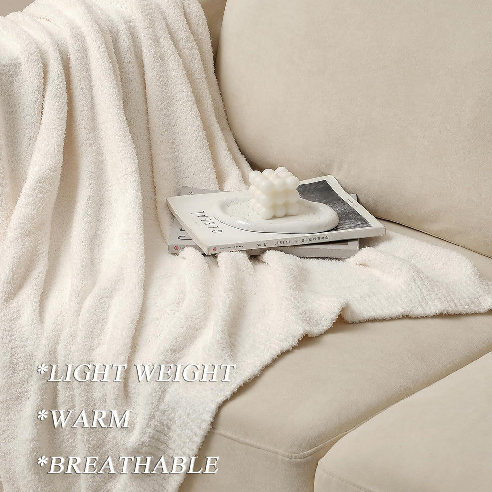 bearberry plaid disposé sur lit, ajoute une couche cosy et décorative