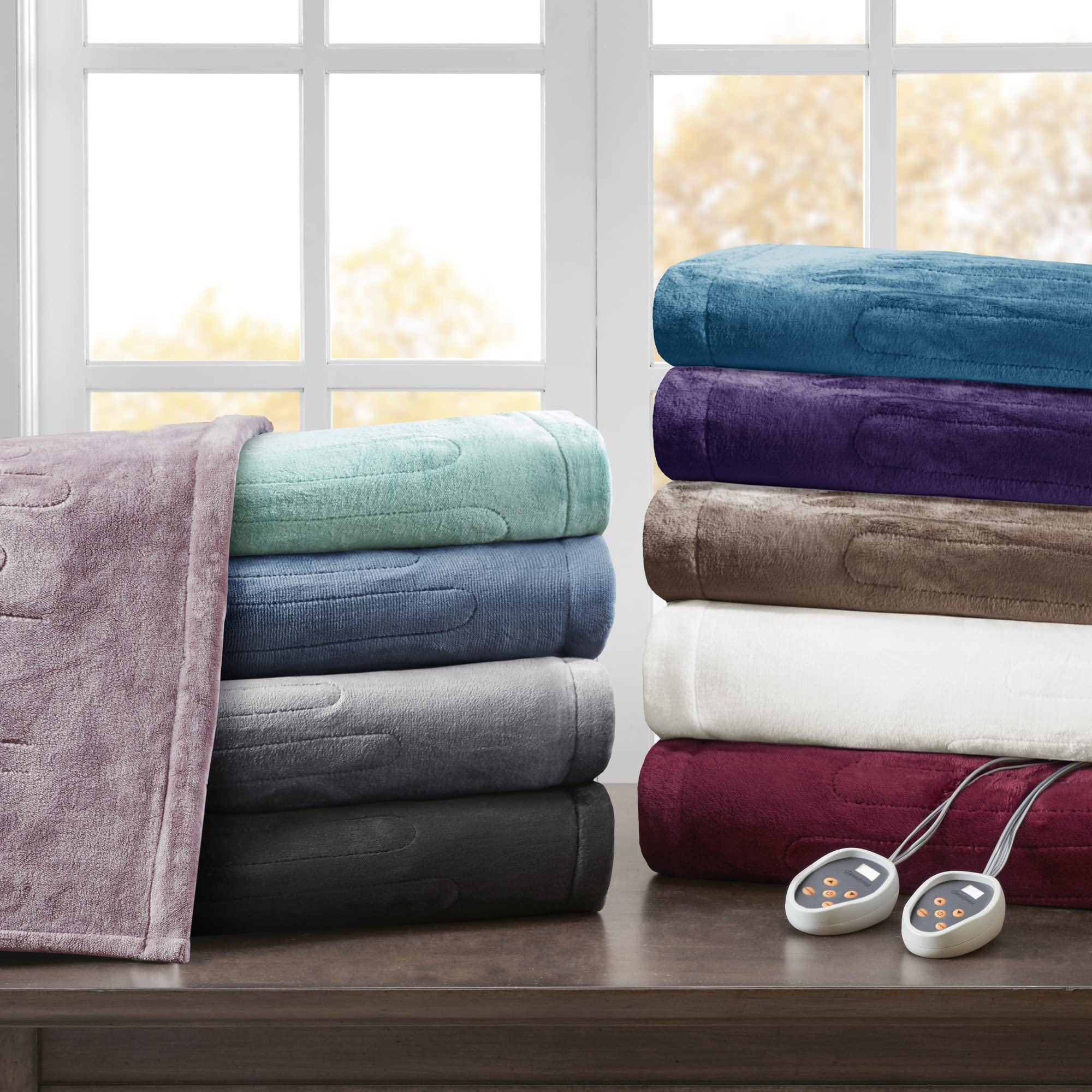 Beautyrest plaid replié dans rangement compact, facilité de manipulation