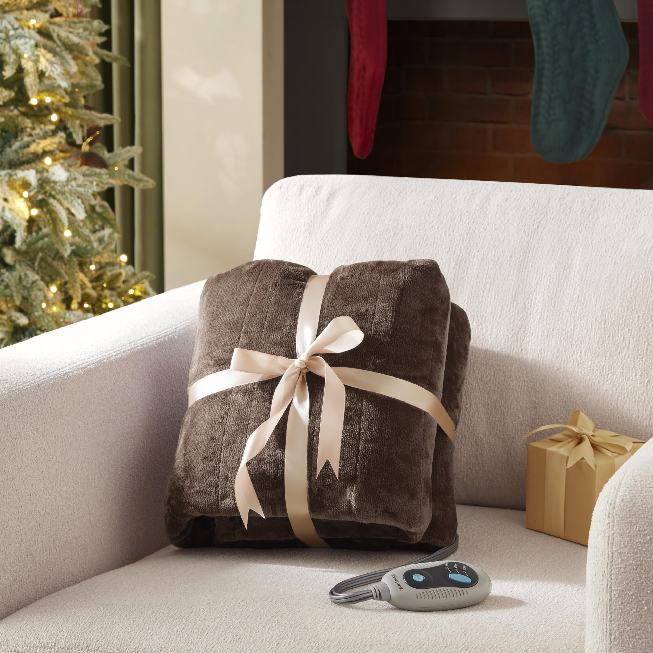 Beautyrest plaid sur canapé créant ambiance cosy et économie d'énergie