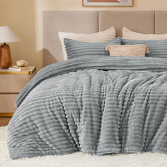 BEDELITE couette face avant gris clair montrant l'aspect luxueux et réchauffant