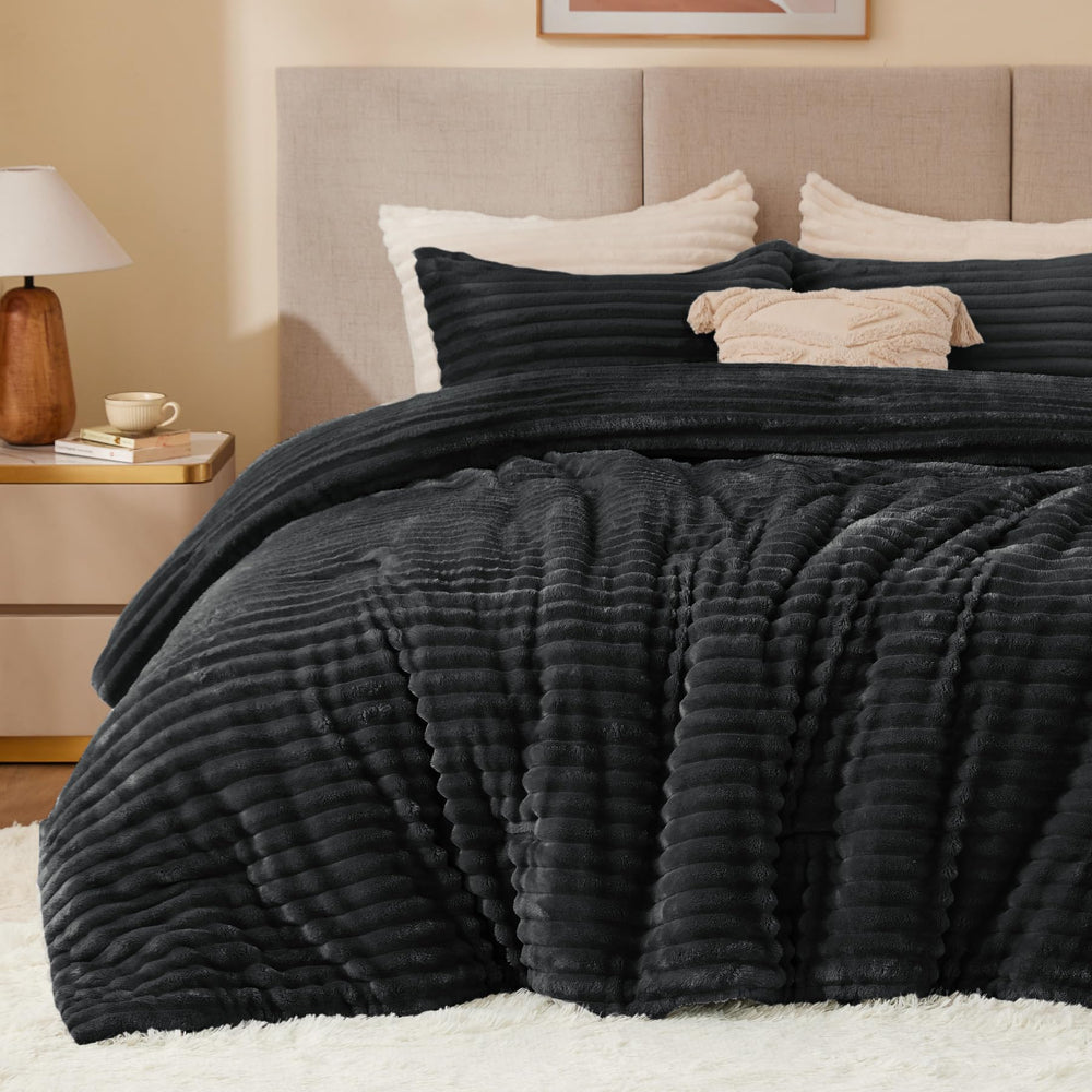 BEDELITE couette face avant noire élégante, apporte chaleur et style