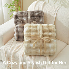 BEDELITE drapée sur canapé pour un look cosy et accueillant
