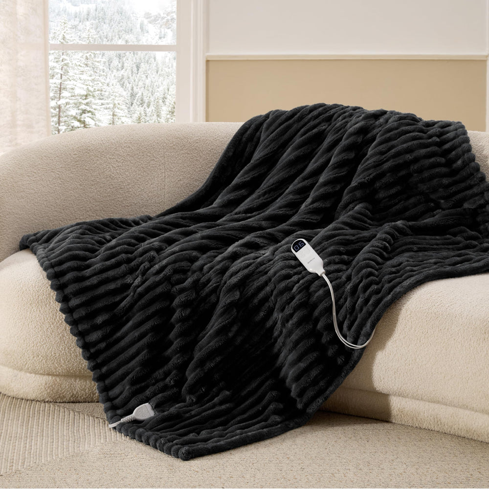 Bedsure couverture chauffante devant posé sur un canapé pour chaleur instantanée