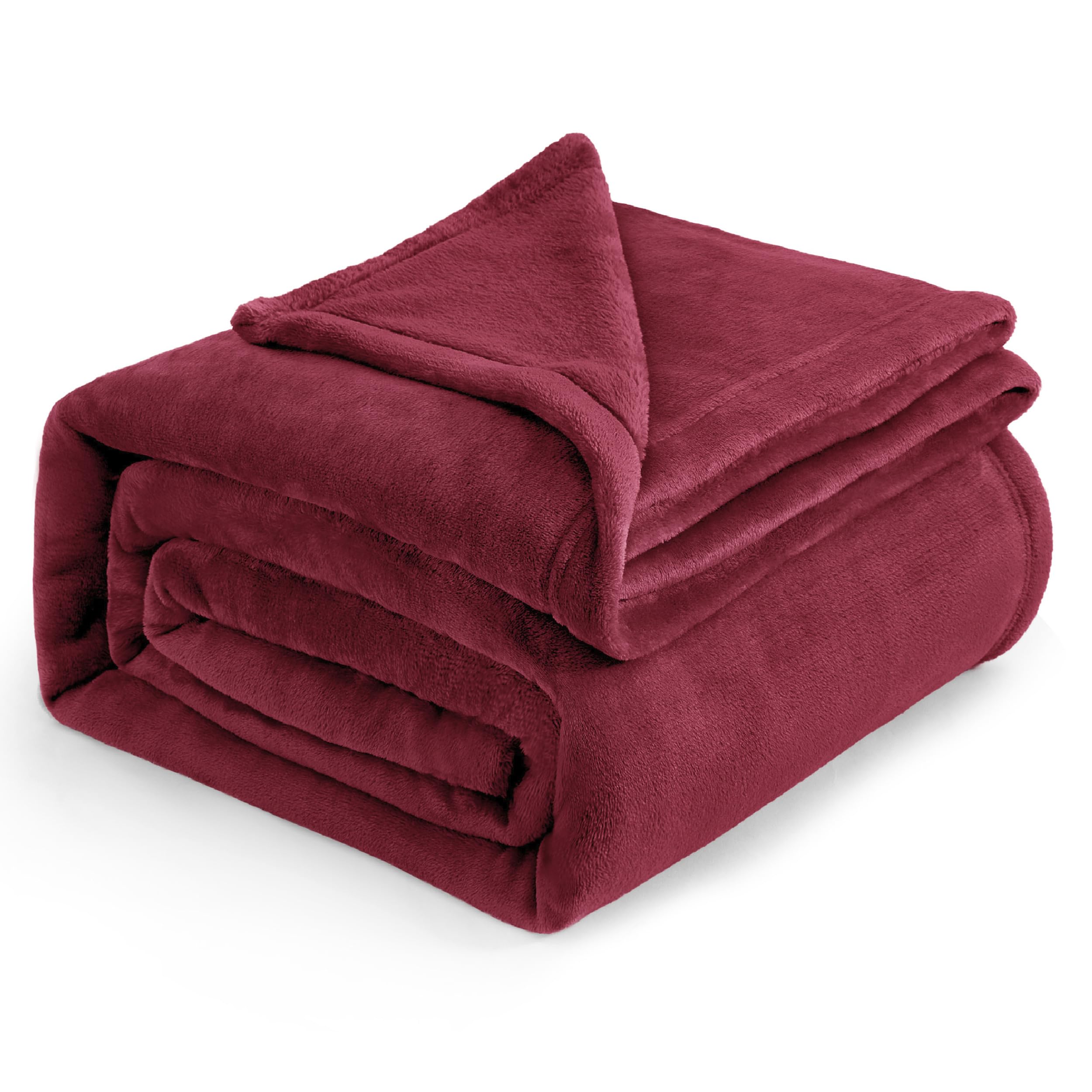 Bedsure couverture pliée montrant couleur rouge et rangement facile