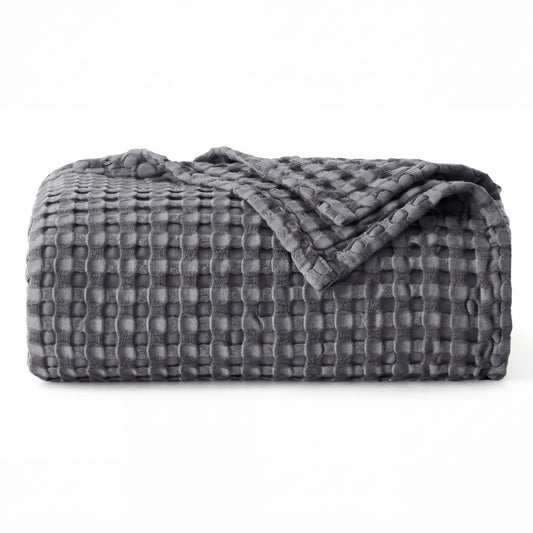 Bedsure couverture gaufrée gris foncé sur lit, chaleur régulée et style