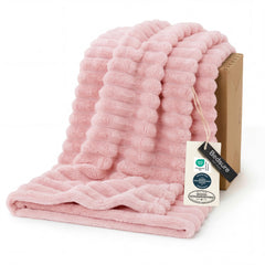 Bedsure plaid corail sur canapé montrant confort et style
