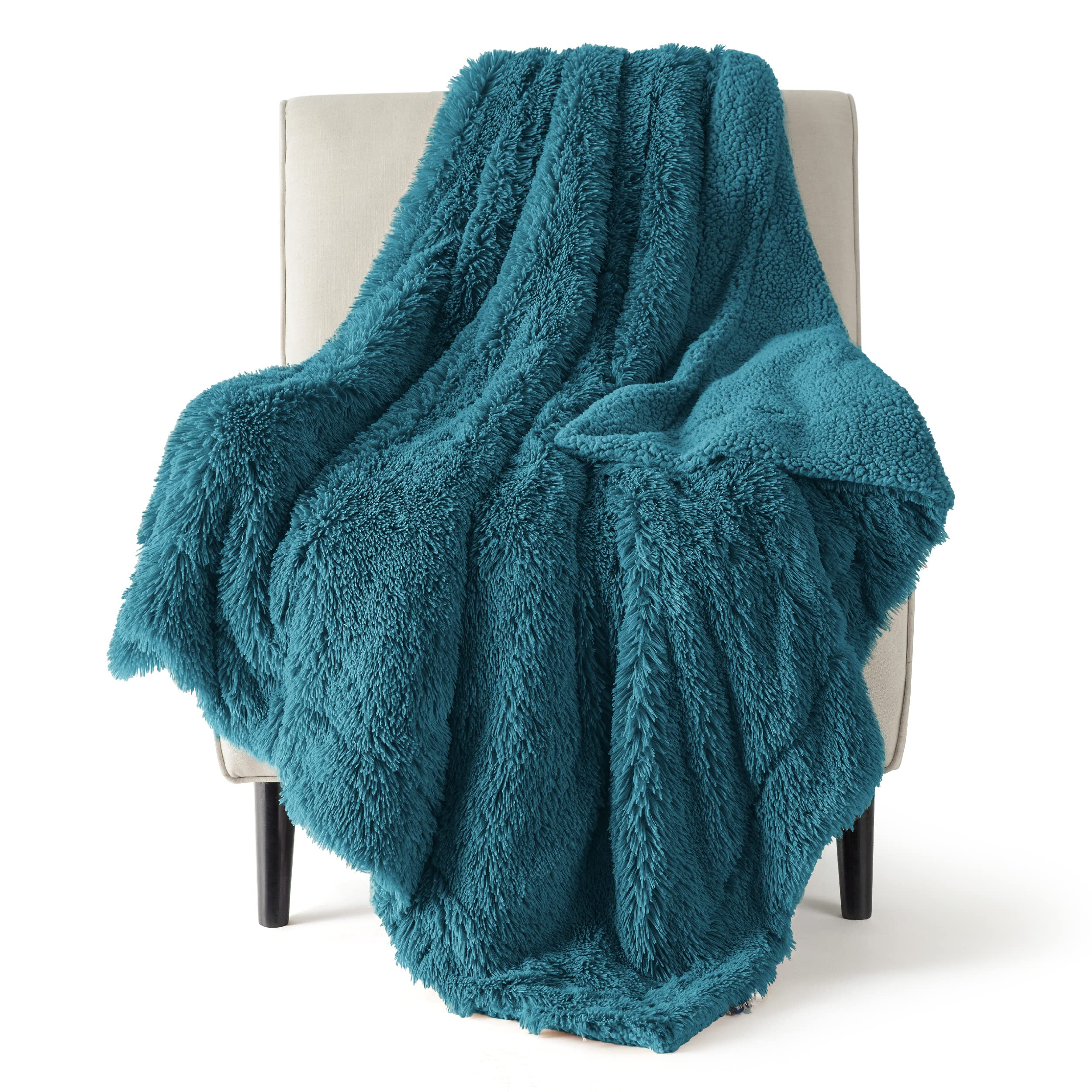 Bedsure plaid plié montrant finition et teinte teal apportant confort décoratif