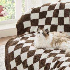 Bedsure plaid posé sur canapé illustrant confort cosy immédiat
