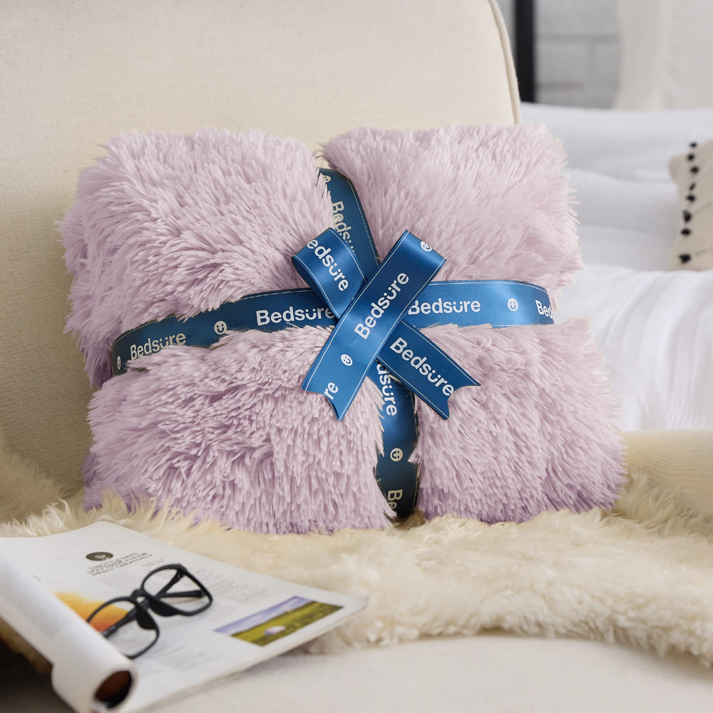 Bedsure plaid utilisé sur canapé révélant confort pour détente