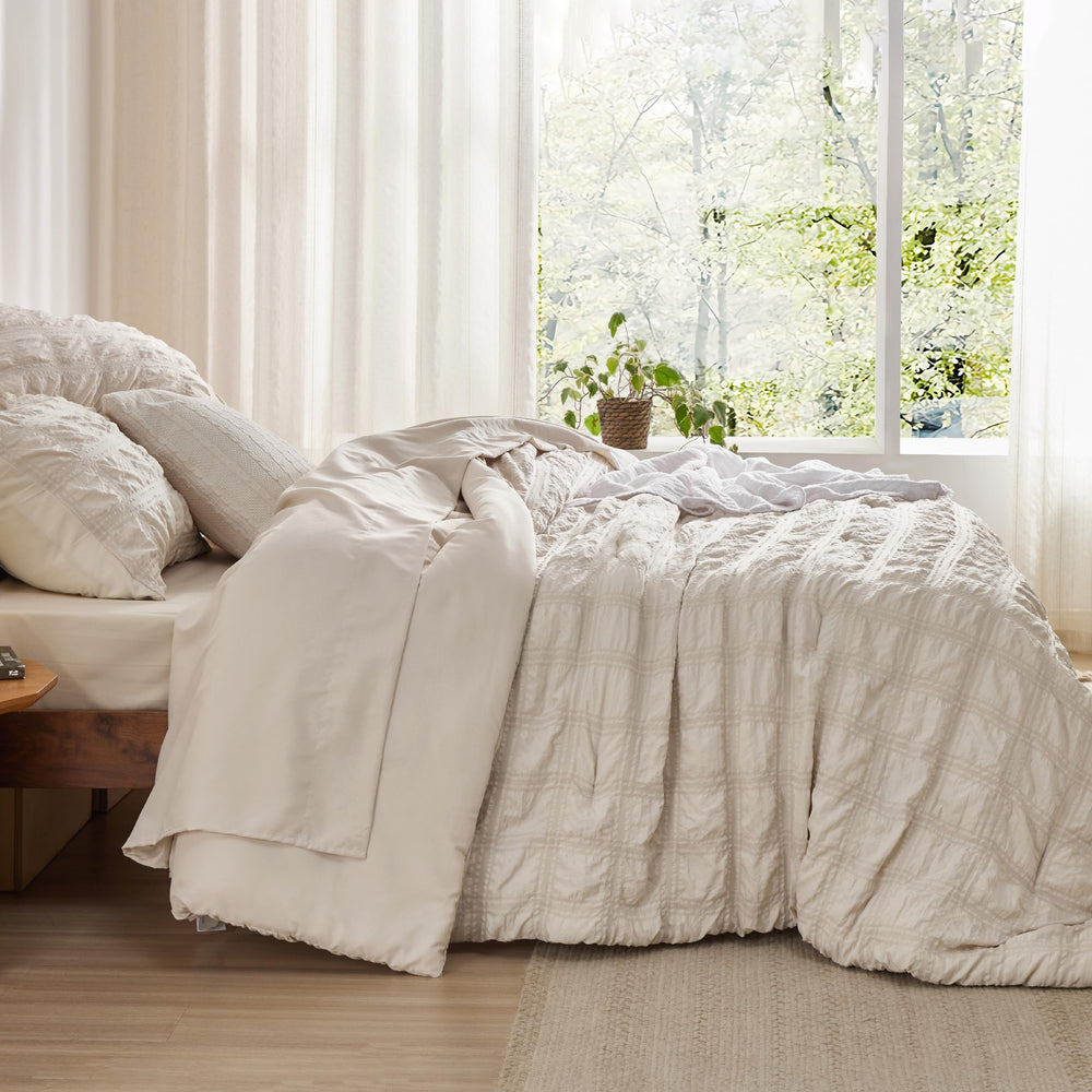 Bedsure taies et draps pliés démontrant la qualité et la douceur au toucher