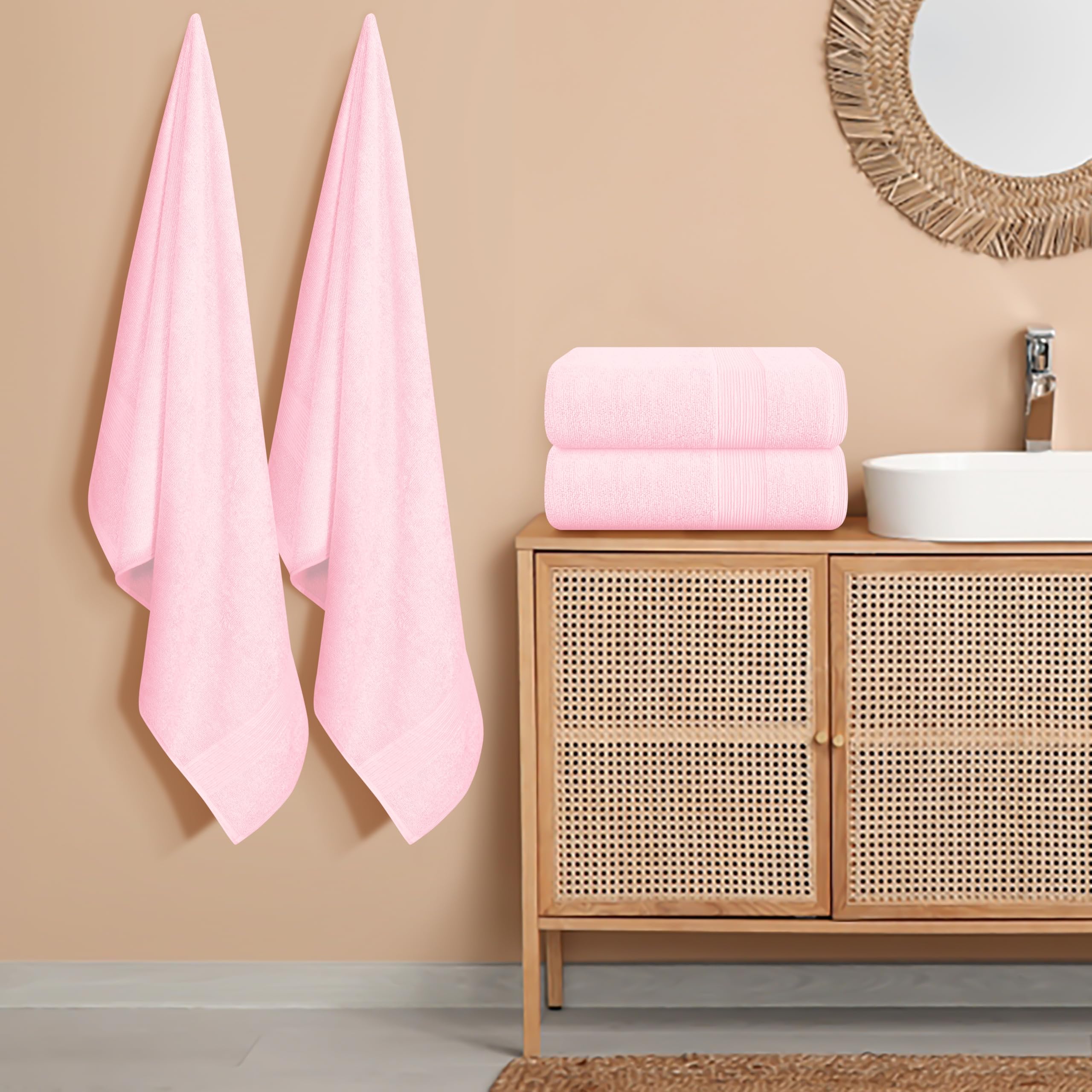 Belizzi Home serviette posée à l'échelle montrant taille 27x54 pour confort