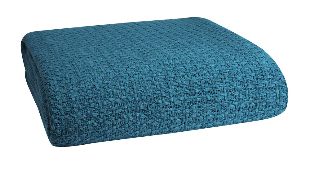Belizzi Home couverture en emballage montrant couleur sarcelle et style