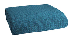 Belizzi Home couverture en emballage montrant couleur sarcelle et style