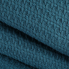 Belizzi Home gros plan du tissu coton montrant texture douce et respirabilité