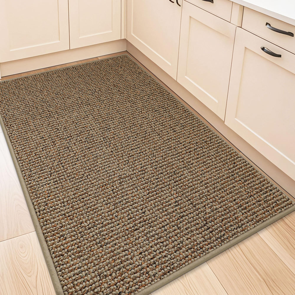 BEQHAUSE vue avant du tapis taupe montrant finition et protection