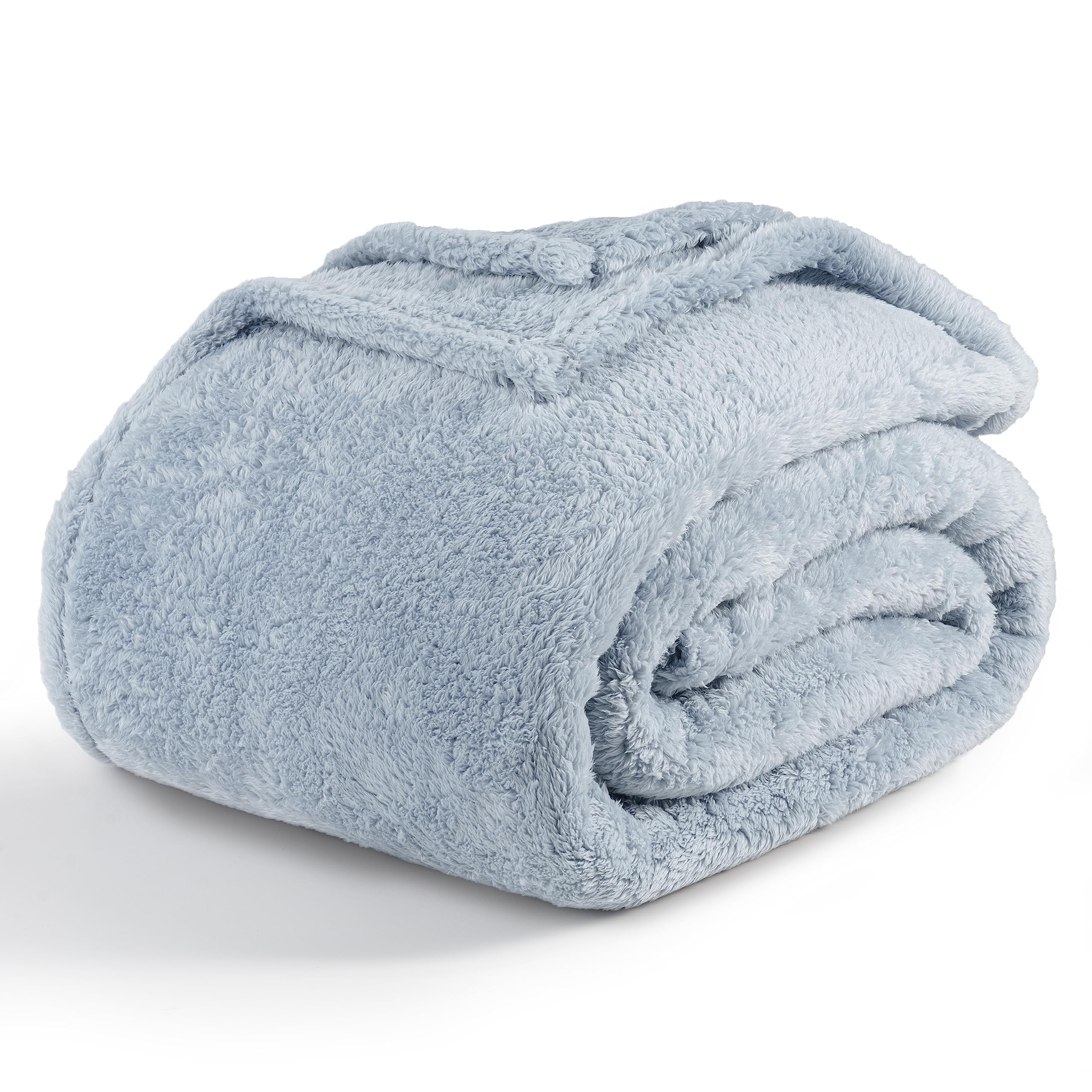 Berkshire Blanket couverture pliée Blue Mist montrant douceur et rangement pratique
