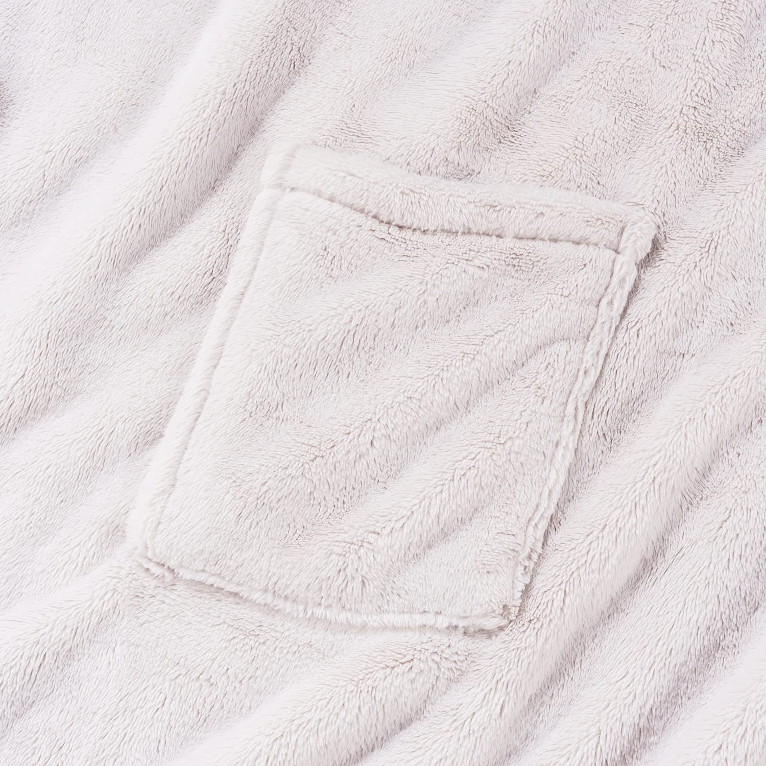 Comparaison de taille Berkshire Blanket Primalush montrant couverture 58x64 pouces