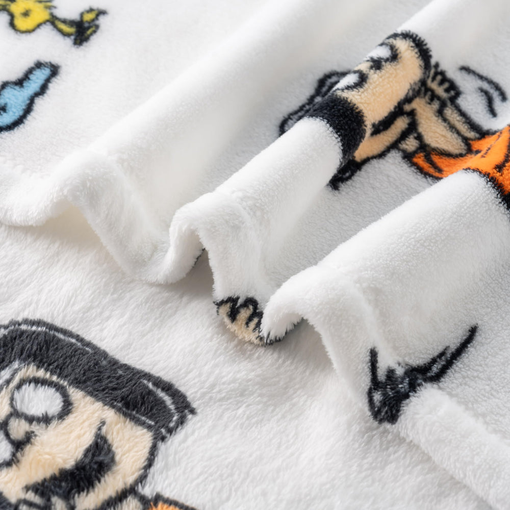 Berkshire Blanket gros plan motif Snoopy, révèle détails d'impression durables