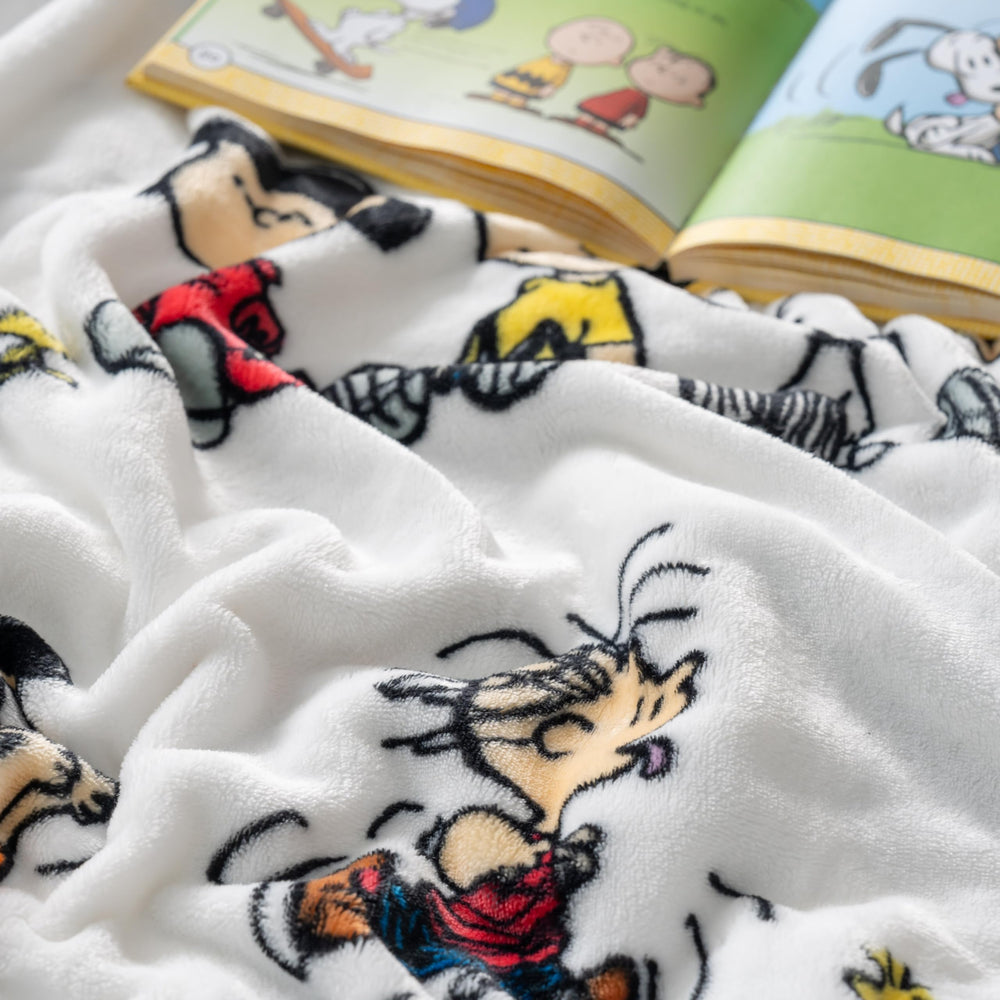 Berkshire Blanket mise en scène chambre, apporte ambiance cosy Peanuts
