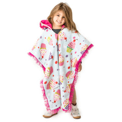 Birdy Boutique poncho devant emballé montrant motif cupcake et protection pratique